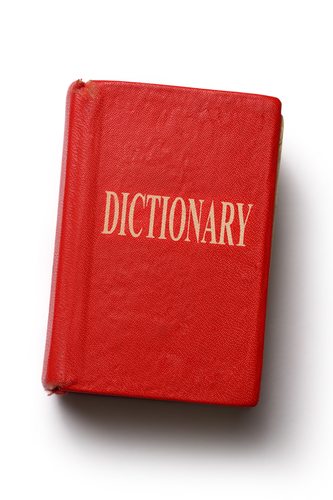 Old dictionary on white background